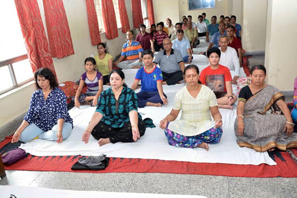 Participants in Yoga Mudra (posture) at ONGC Officers’ Club at Golf Green, Kolkata
