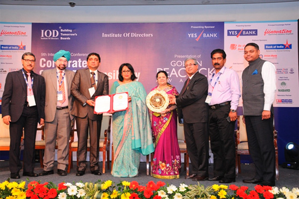 Chief CSR receives the Golden Peacock award on behalf of ONGC