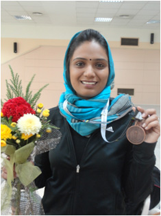 Ms.Chaudhry proudly displays the Bronze Medal