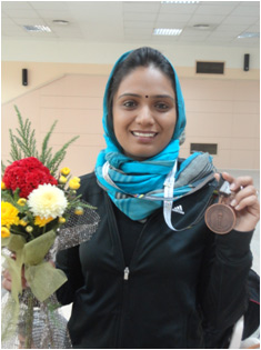 Ms.Chaudhry proudly displays the Bronze Medal