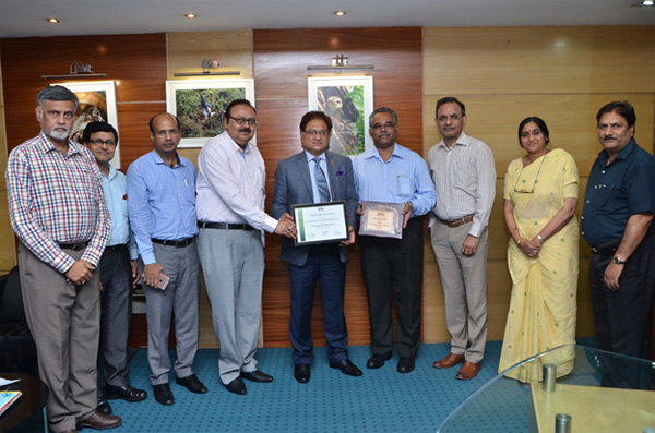 ONGC team sharing the award of Best CSR Project with Director (HR) Mr D D Misra at Delhi