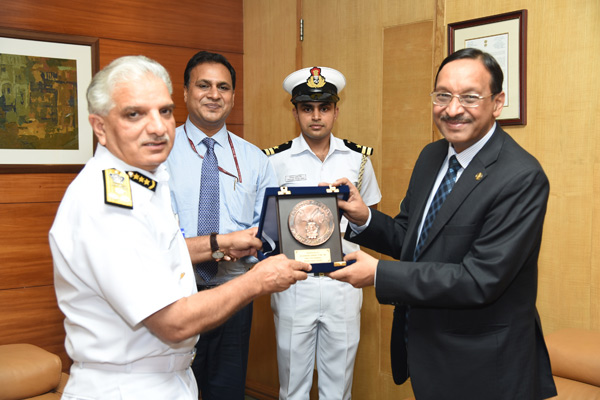 DG Coast Guard (left) presenting a memento to ONGC CMD at the latter's office on 7 June 2016