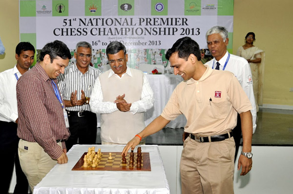 A game being flagged off: Sasikaran (right) making his opening move