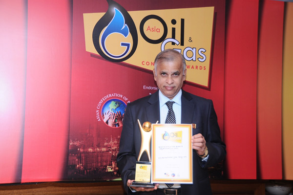 Mr. Marathe with the award on behalf of CMD Mr. Marathe with the award on behalf of CMD