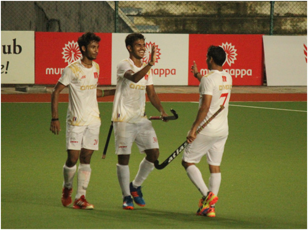 ONGC’s PA Machaiah celebrating with mates after scoring 3rd goal