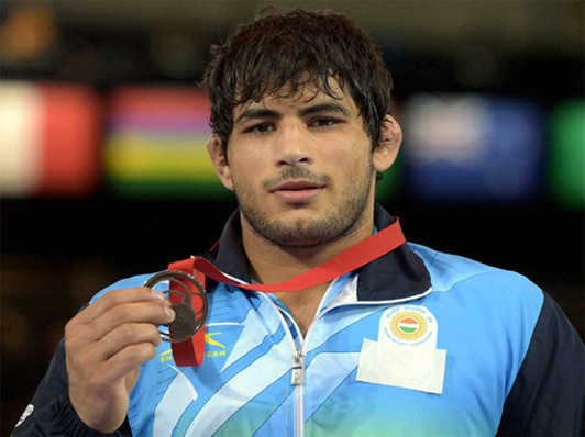 Pawan Kumar with his Bronze medal in the Men's Wrestling 86kg category
