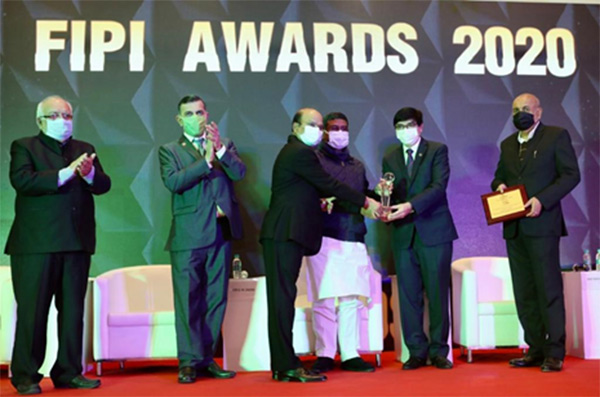 CMD & Director (Offshore) receiving FIPI Project Management Company of the year Award from Petroleum Minister