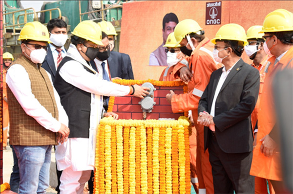 Petroleum Minister Dharmendra Pradhan pressing the switch to start the Sucker Road Pump on well Asokenagar#1, accompanied by MP  Jyotirmay Singh Mahato, ONGC CMD Shashi Shanker and other senior officials