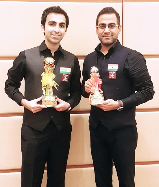 ONGCians Pankaj Adani (Left) and Sourav Kothari (Right) with their respective Gold and Bronze trophy