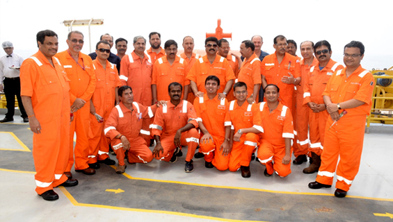 Dharmendra Pradhan Minister of State (I/C) MoPNG with ONGC officers and staff at rig Virtue 1 in Mumbai offshore