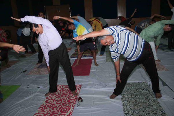 ONGCians performing Yoga with great enthusiasm