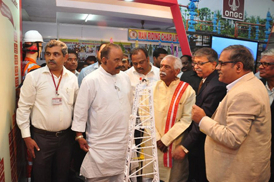 Asset Manager Debasis Sanyal (extreme right) explaining the drilling operation to the Hon'ble Minister