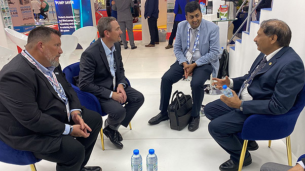 Director (T&FS) interacting with Neal Lux from FET at ADIPEC 2022