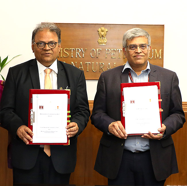 ONGC Chairman and MoPNG Secretary displaying the signed MoU 2022-23